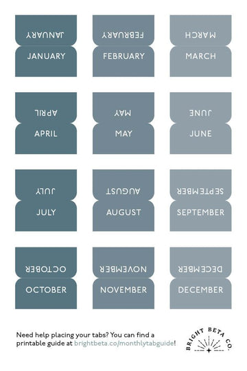 Monthly tab stickers applied to the edge of a No Limits Planner